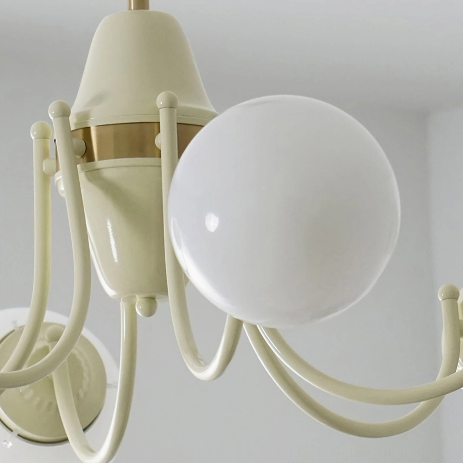 Three-head mid-century modern globe chandelier, compact design with cream and brass finishes