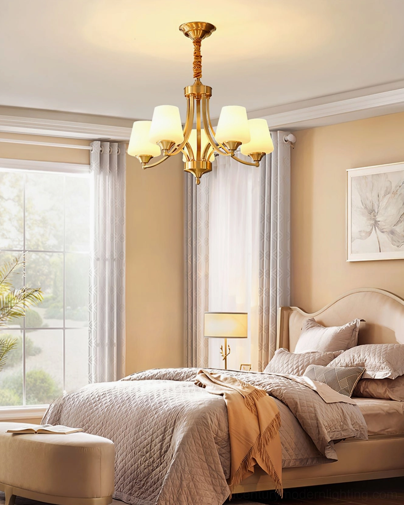 4-light brass chandelier hanging in master bedroom with upholstered bed and warm neutral bedding
