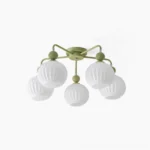 5-light sage green mid-century modern ceiling chandelier with ribbed white glass shades, overhead studio view