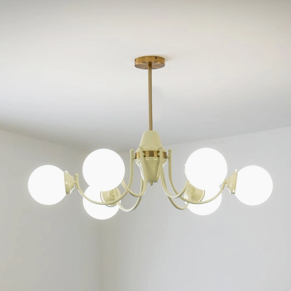 Cream and brass globe chandelier, six-head configuration, full product view with warm metal accents