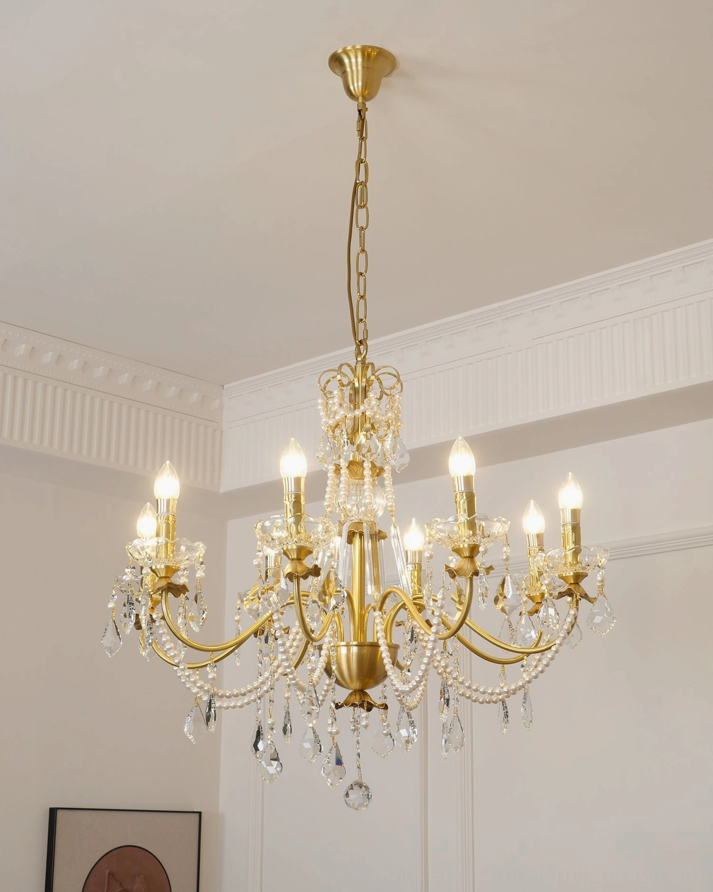 6-light brass crystal chandelier with polished brass frame and multiple crystal pendant ornaments