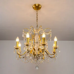 Illuminated 8-head Fauna crystal chandelier with gold finish mounted on ceiling, showing warm light refraction through premium crystals