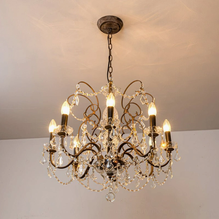 8-head Fauna crystal chandelier with rust-colored finish and clear crystals creating warm vintage luxury aesthetic