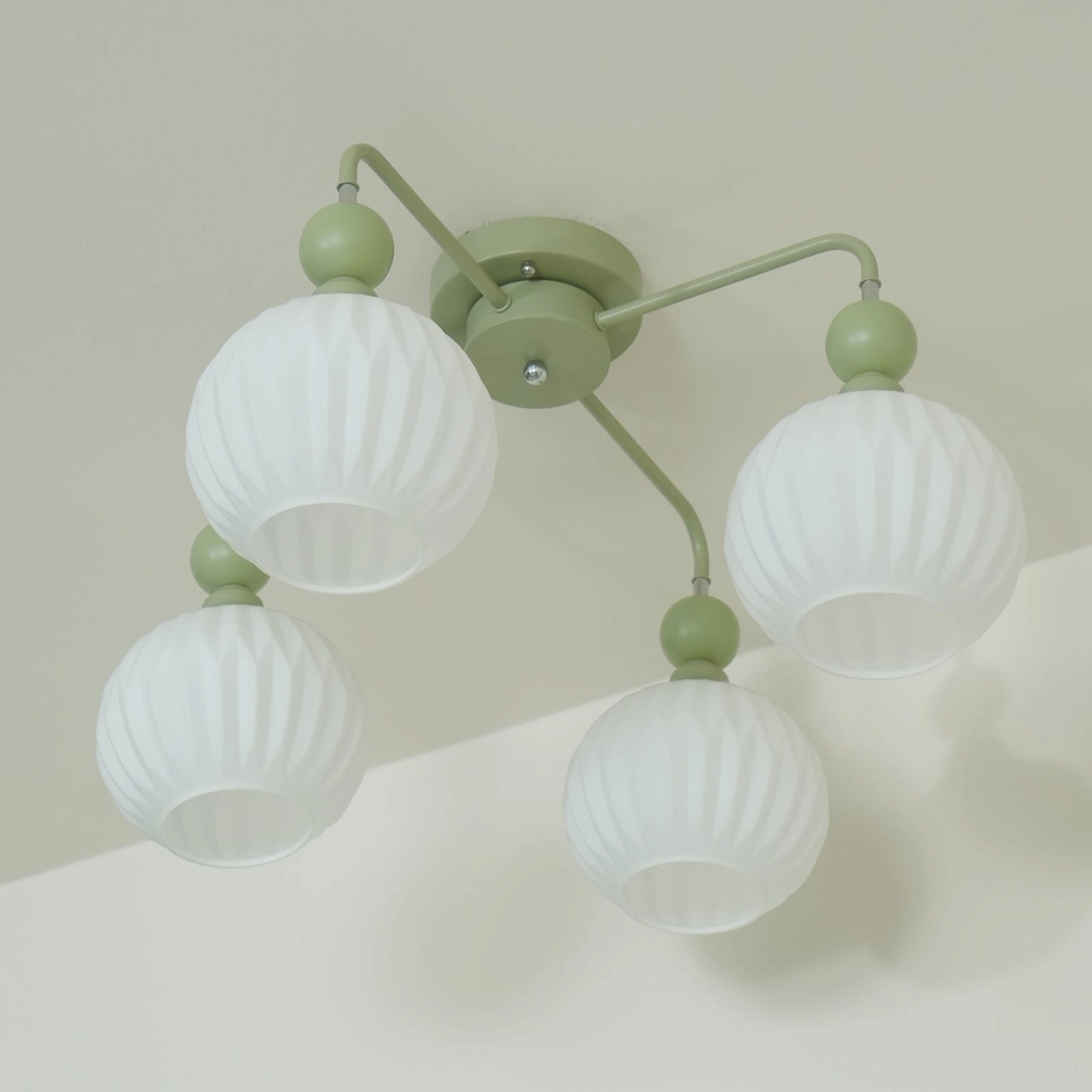 8-head mid-century ceiling light showing multiple glass shades and metal structure