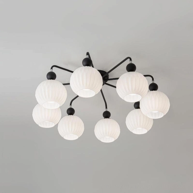 8-head matte black modern ceiling light in spacious interior, statement fixture