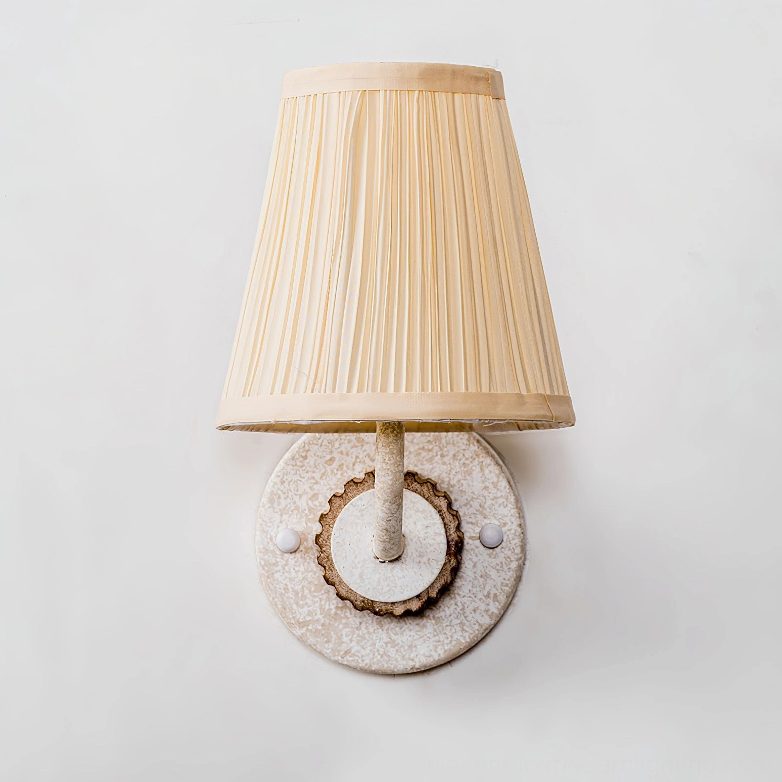 Abbey sconce bottom front view showing metal stem construction and base mounting