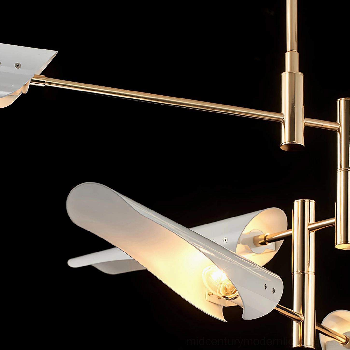 Contemporary sputnik chandelier with brass gold and matte black finish showing head positioning versatility