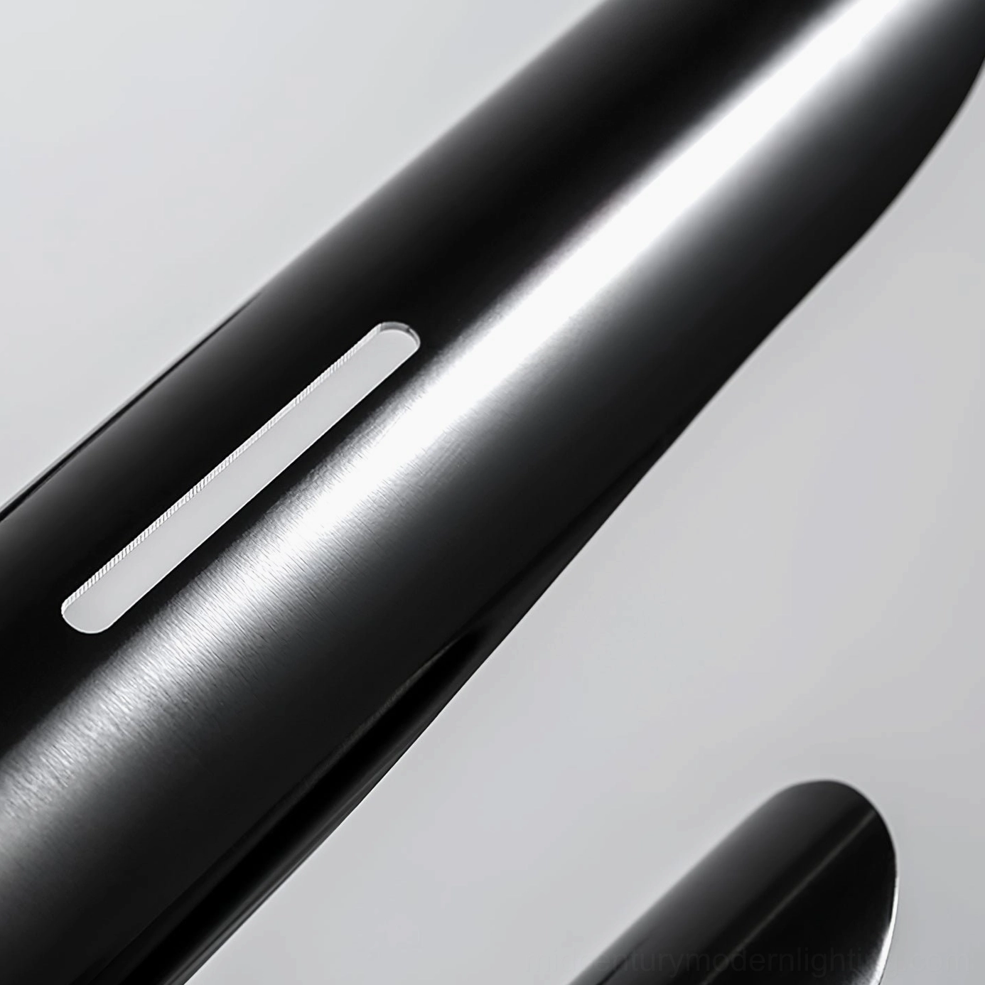 Close-up macro view of Abelon chandelier matte black metal lamp shade with smooth texture and integrated LED light