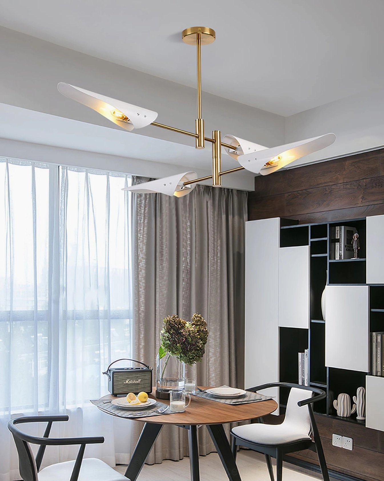 Modern multi-head chandelier with kinetic articulated design in sophisticated interior lighting installation