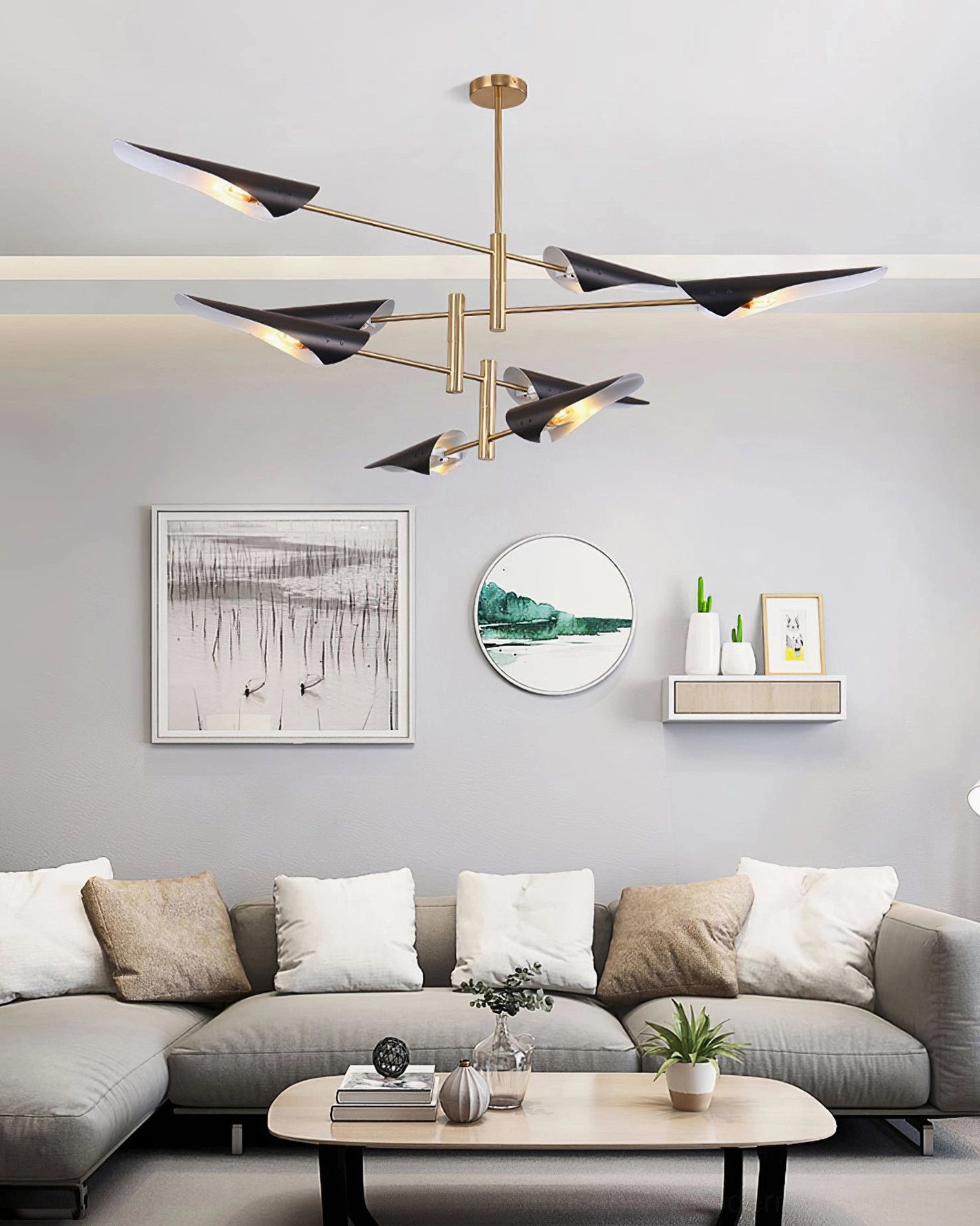 Sculptural sputnik pendant with multiple articulated arms and contrasting brass gold black materials