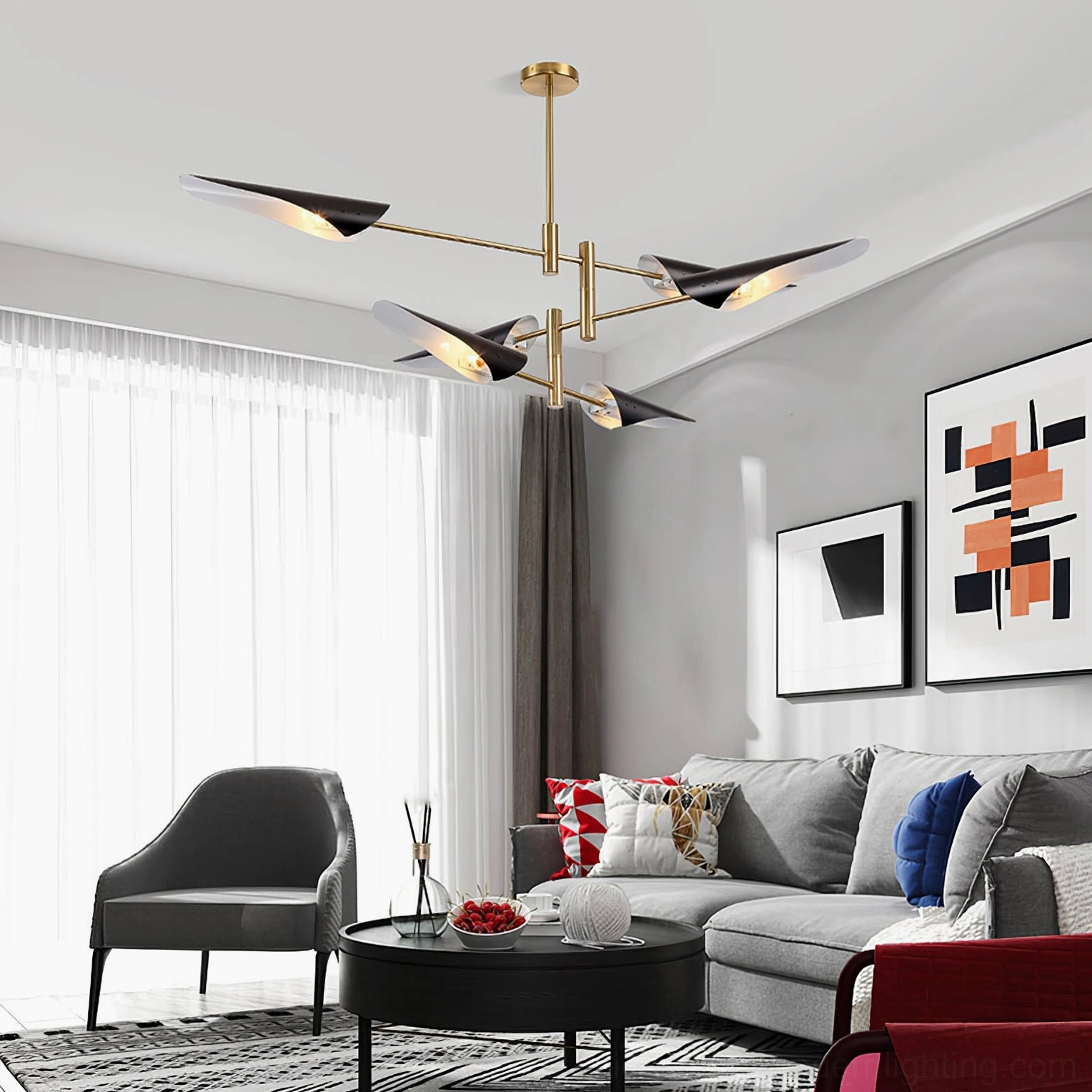 Multi-branch sputnik pendant light with brass gold frame and articulated black lamp heads in grey contemporary living room