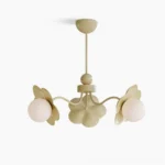 Acacia 3-light floral chandelier with creamy yellow finish, front studio view showcasing botanical petal-shaped acrylic shades and metal frame