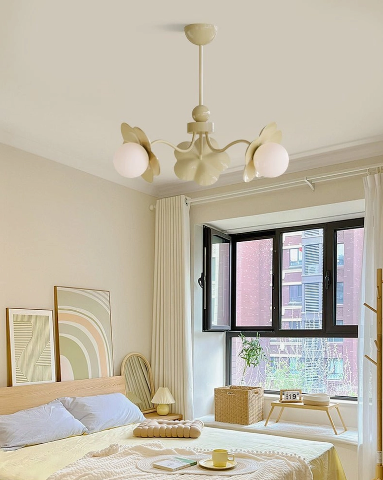 Acacia floral chandelier modern minimalist bedroom with warm ceiling lighting and outdoor window view, demonstrating contemporary home decor application
