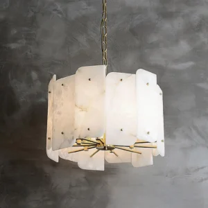 Close-up detail of polished brass components and natural alabaster stone veining on Acevedo pendant chandelier