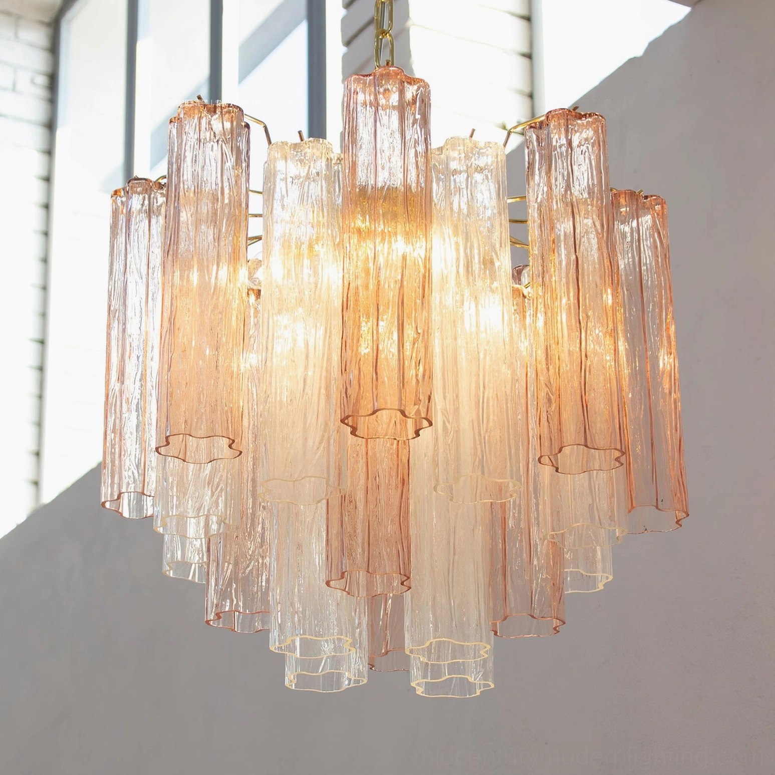 Addis amber murano glass chandelier warm glowing ambient mood lighting elegant space