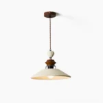 Adelaide mid-century pendant light with beige resin shade and walnut wood detailing, front studio view