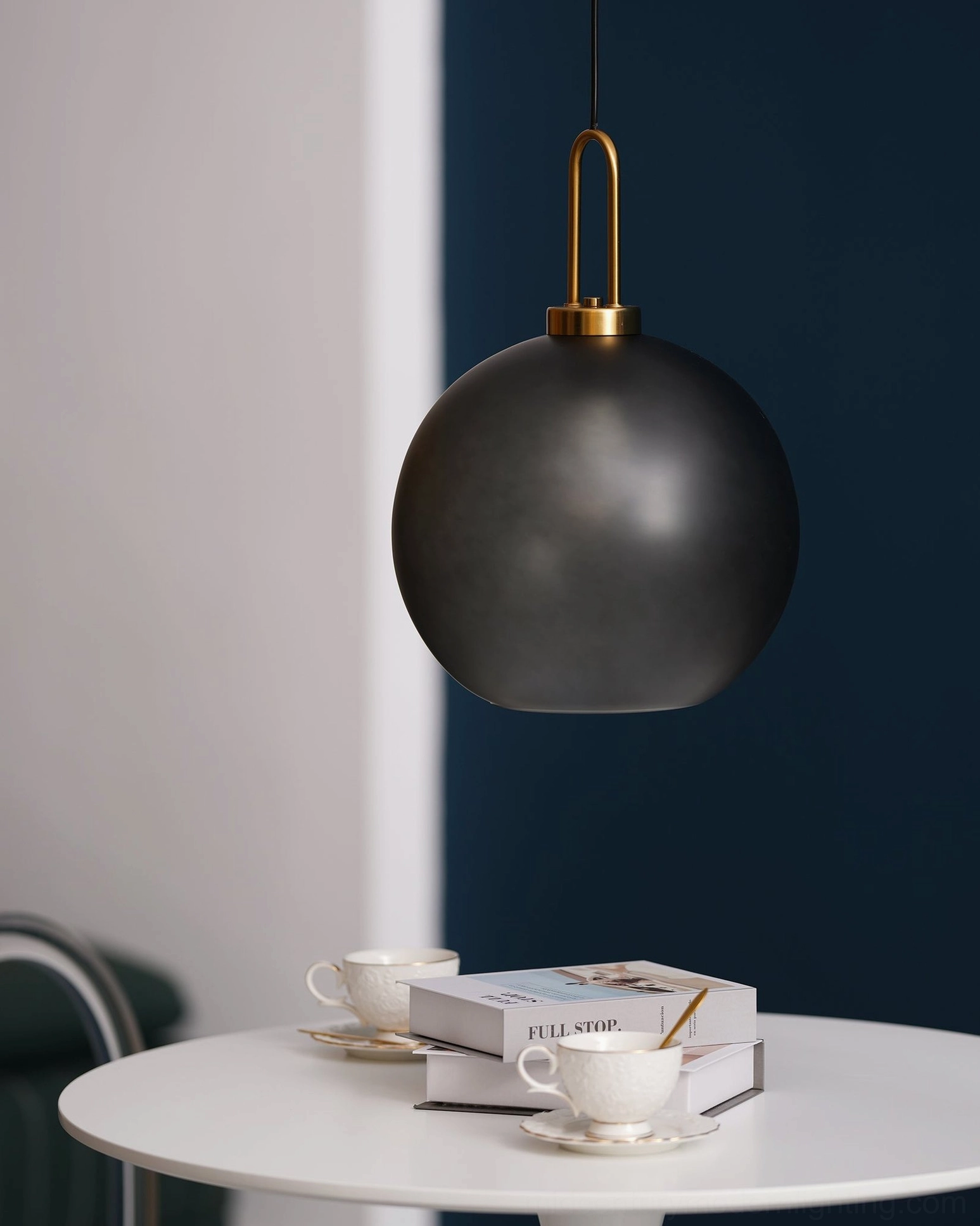Adjustable hanging wire system on smoked glass pendant allowing custom height installation