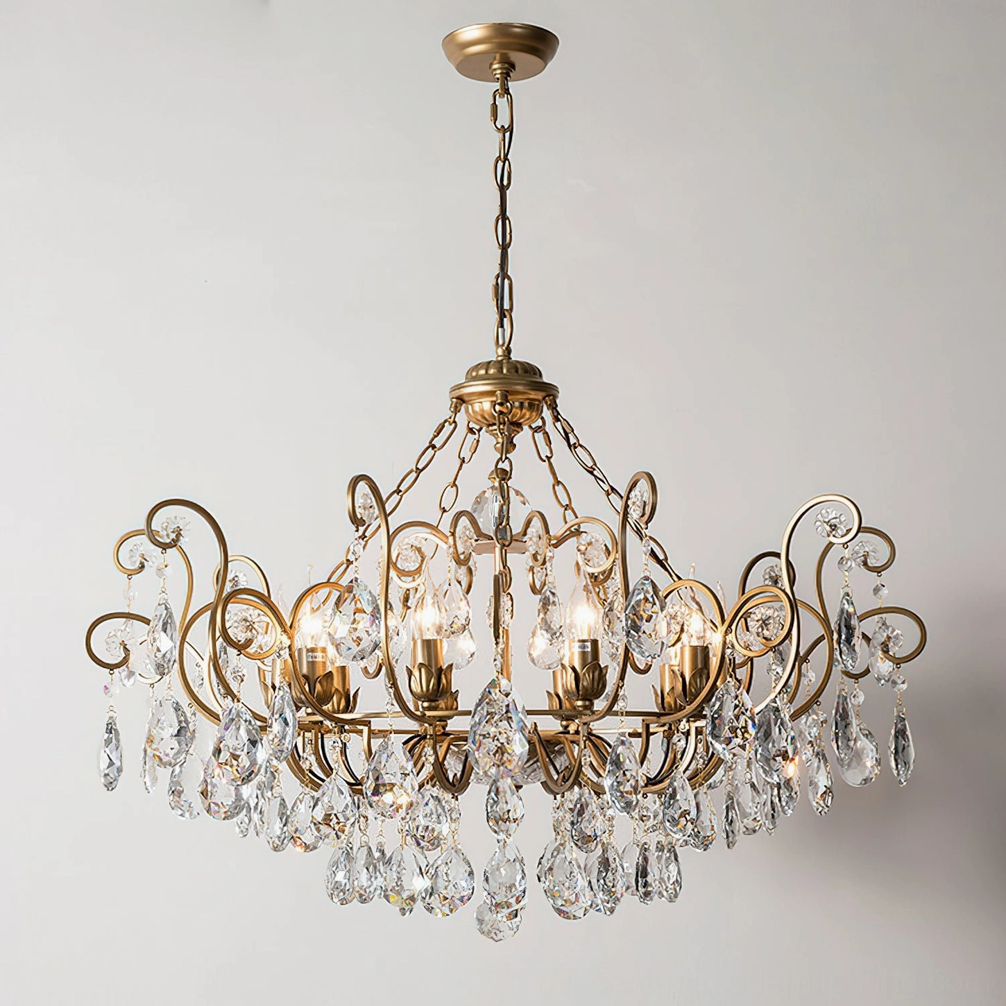 Aeliana Crystal Chandelier 10-head configuration in gold finish showcasing full ornate scrollwork and multiple crystal pendant elements