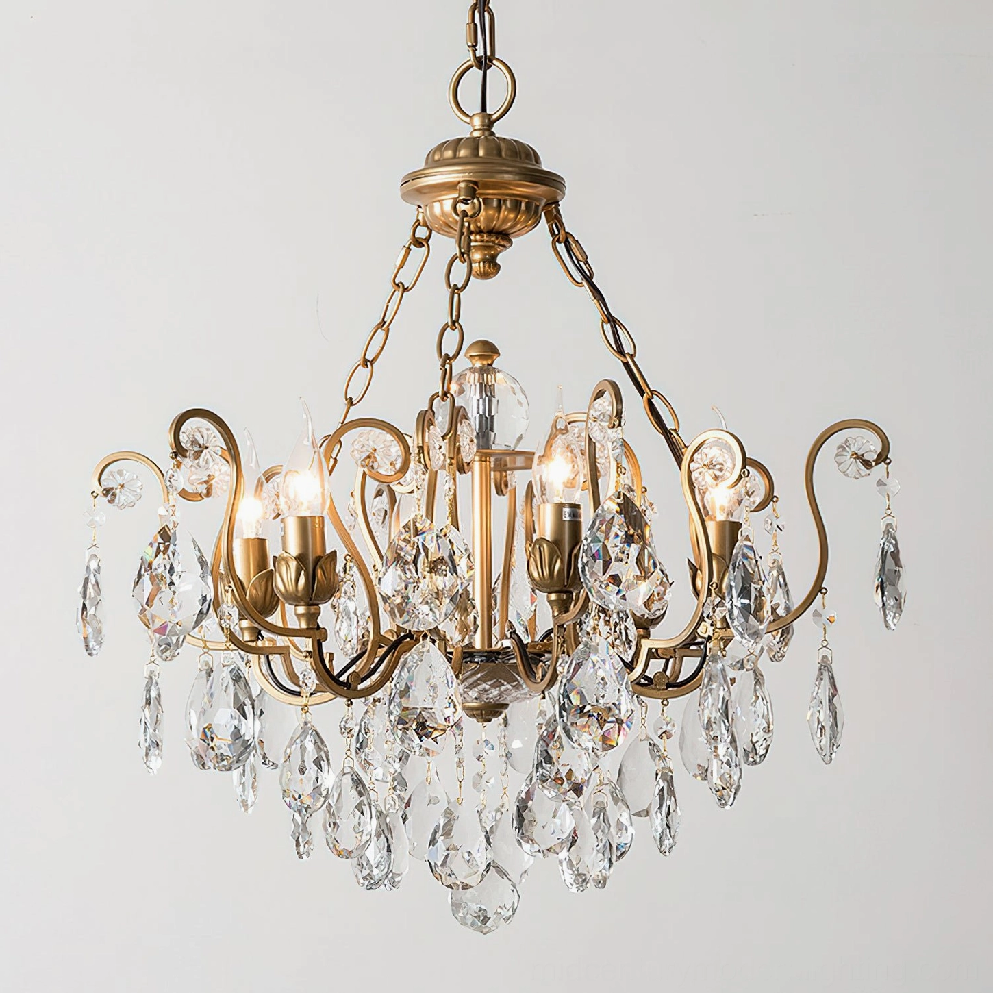 Aeliana Crystal Chandelier lighting detail showing crystal refraction and faceted pendant light properties in warm illumination