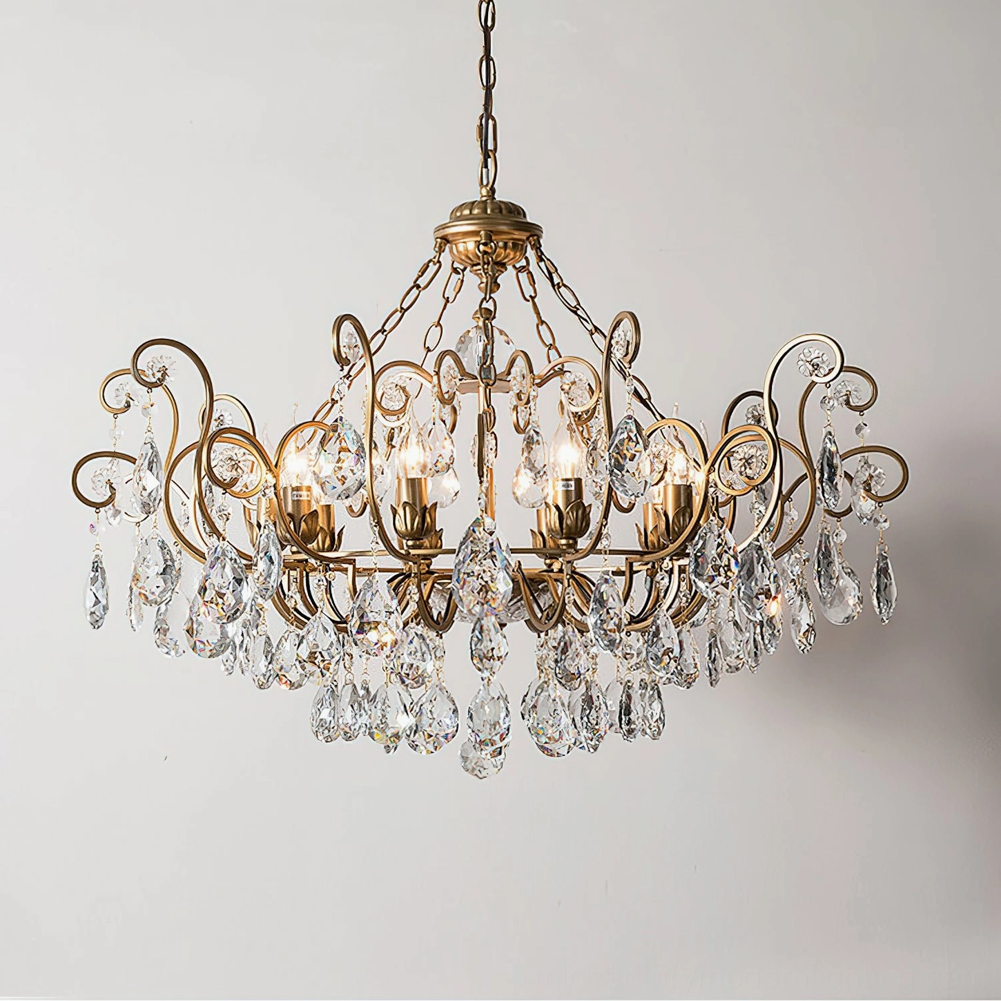 Overhead close-up detail of Aeliana Crystal Chandelier showing brass frame and faceted crystal decorations in vintage luxury style
