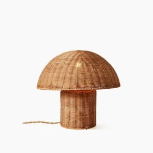 Aero rattan mushroom table lamp with natural woven texture on white background, mid-century modern design