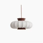 Aeron fabric pendant light with walnut wood frame and white ribbed diffuser in studio lighting