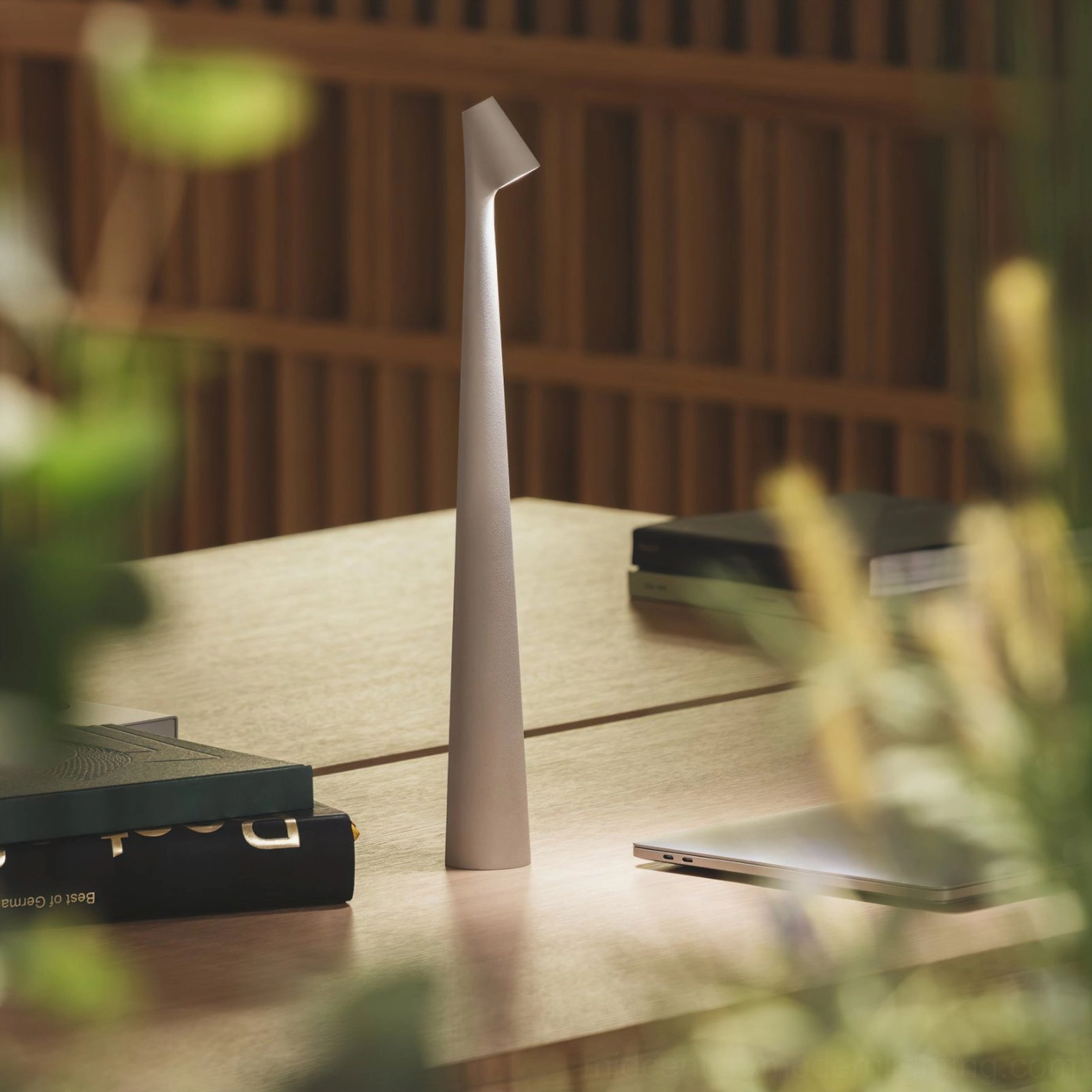Africa rechargeable table lamp with neutral matte finish in minimalist desk setting