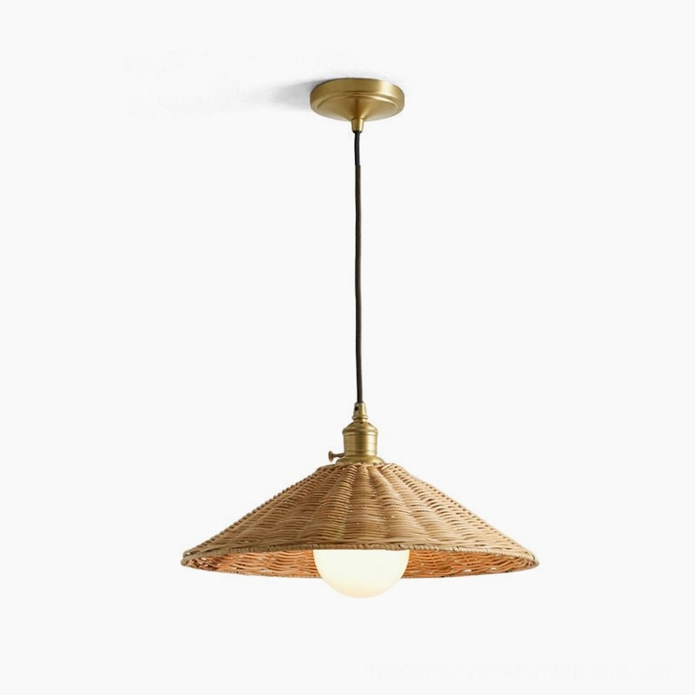 Agoura small handwoven rattan pendant light with brushed gold hardware, artistic display
