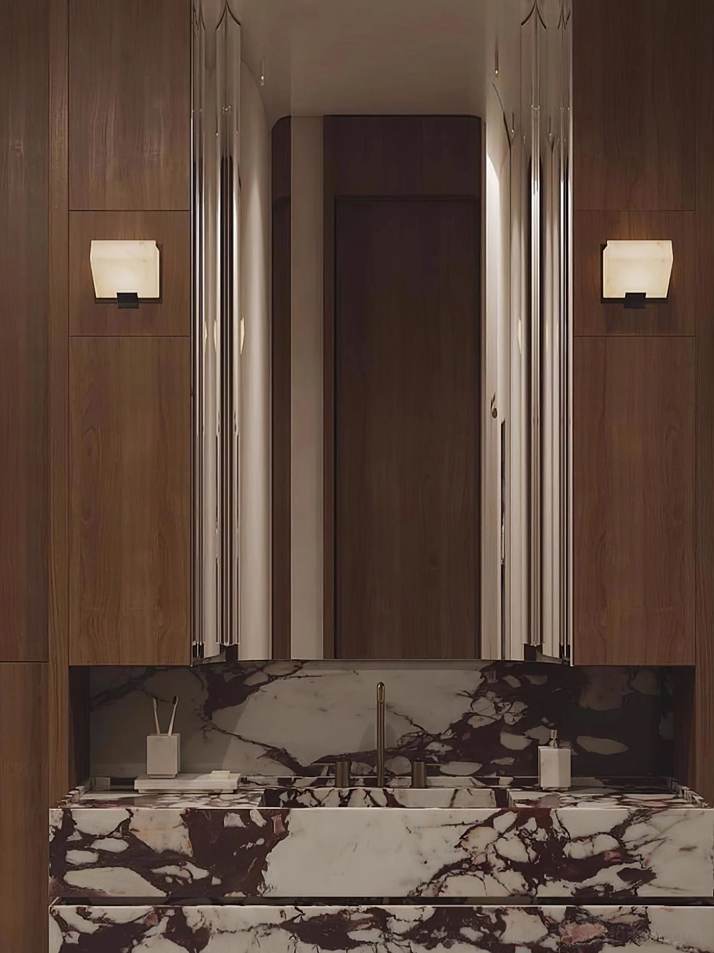 Square alabaster wall sconces pair on luxury marble bathroom vanity, creating warm accent lighting and spa-like atmosphere
