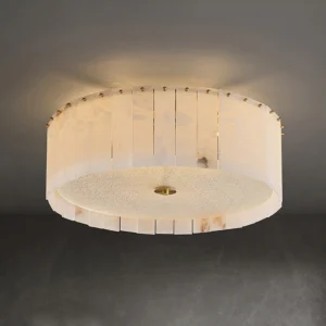 Mid-century alabaster ceiling lamp glowing warmly in modern interior space with grey walls
