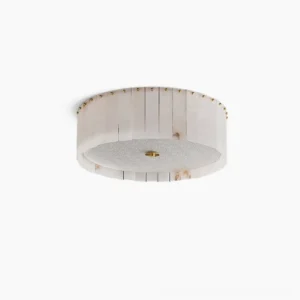 Alabaster drum ceiling light with brass details on white background, modern mid-century flush mount fixture