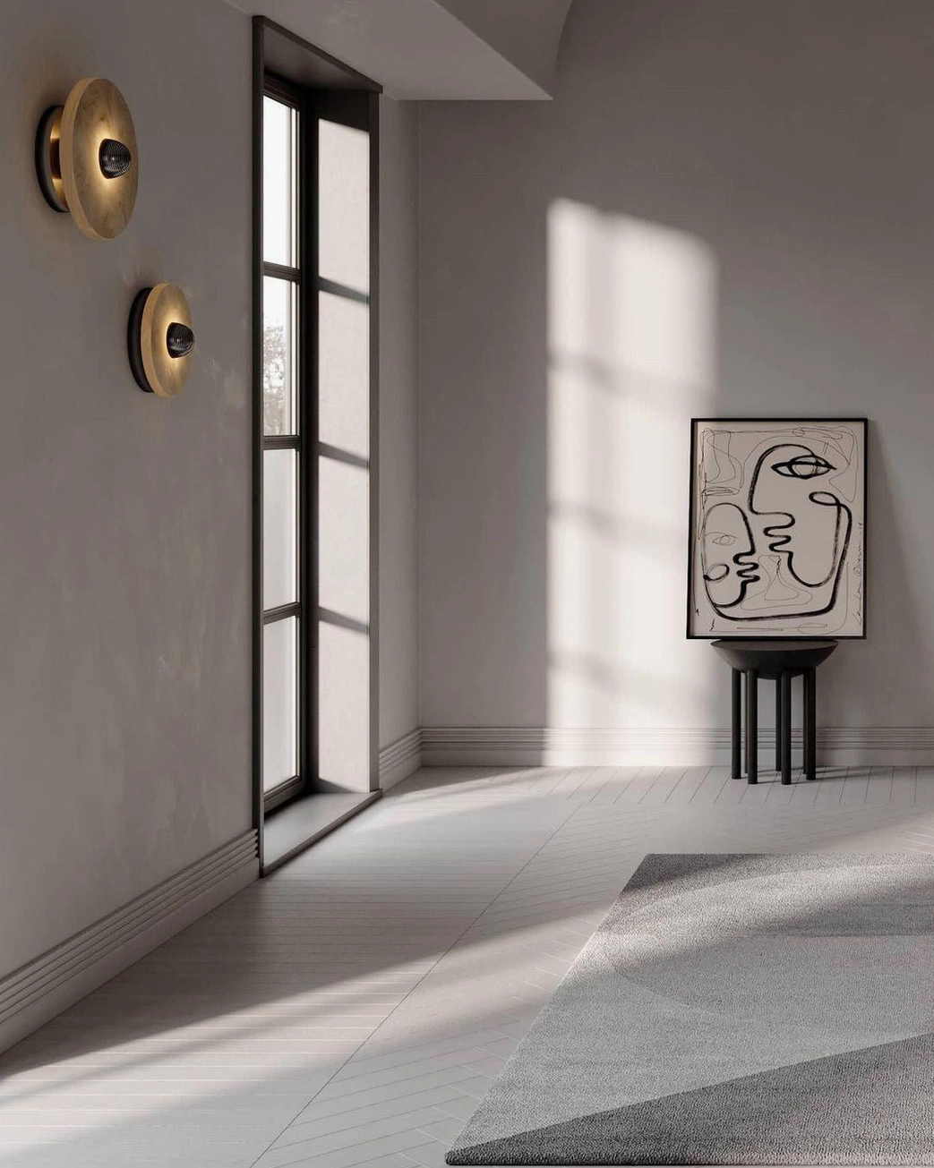 Round alabaster wall light in minimalist bedroom setting, soft warm glow on neutral wall