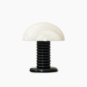 Alabaster mushroom table lamp with black ribbed base, front view on white background - mid-century modern design
