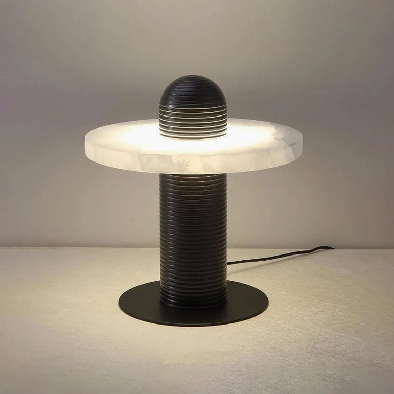 Black and white Alabaster Planes Table Lamp compact model showing geometric planes and fluted metal armature construction