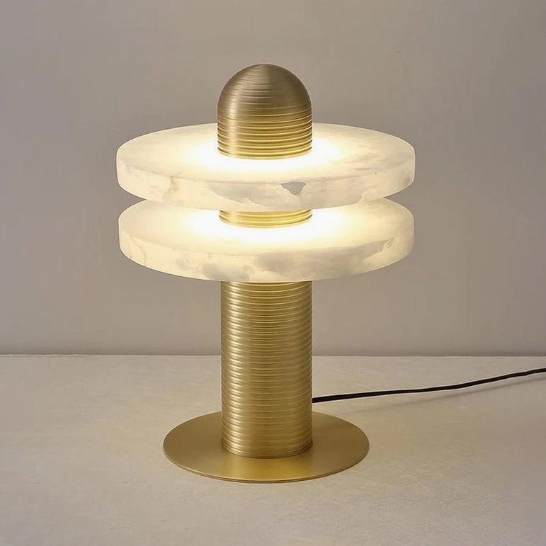 Gold finish Alabaster Planes Table Lamp with warm metal frame and translucent alabaster shades, contemporary sculptural lighting
