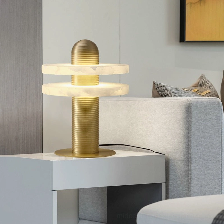 Gold finish Alabaster Planes Table Lamp with white alabaster shades in contemporary living room with ambient lighting