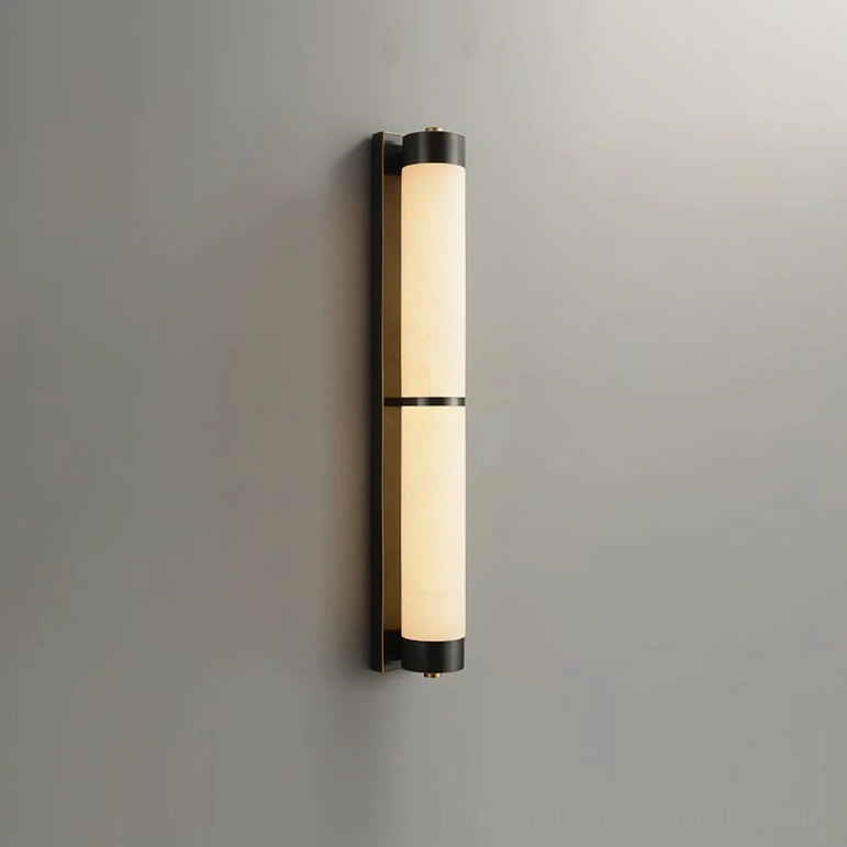 Single alabaster wall sconce with matte black metal backplate and black and gold trimmed shade, front view