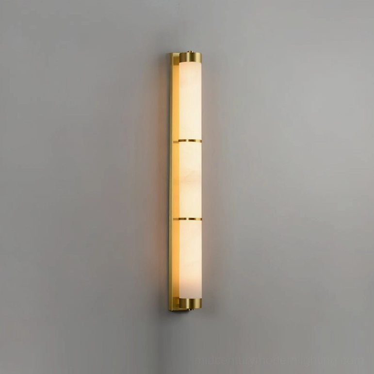 Alabaster wall sconce fixture with brass hardware and natural stone segmentation, detailed architectural lighting design