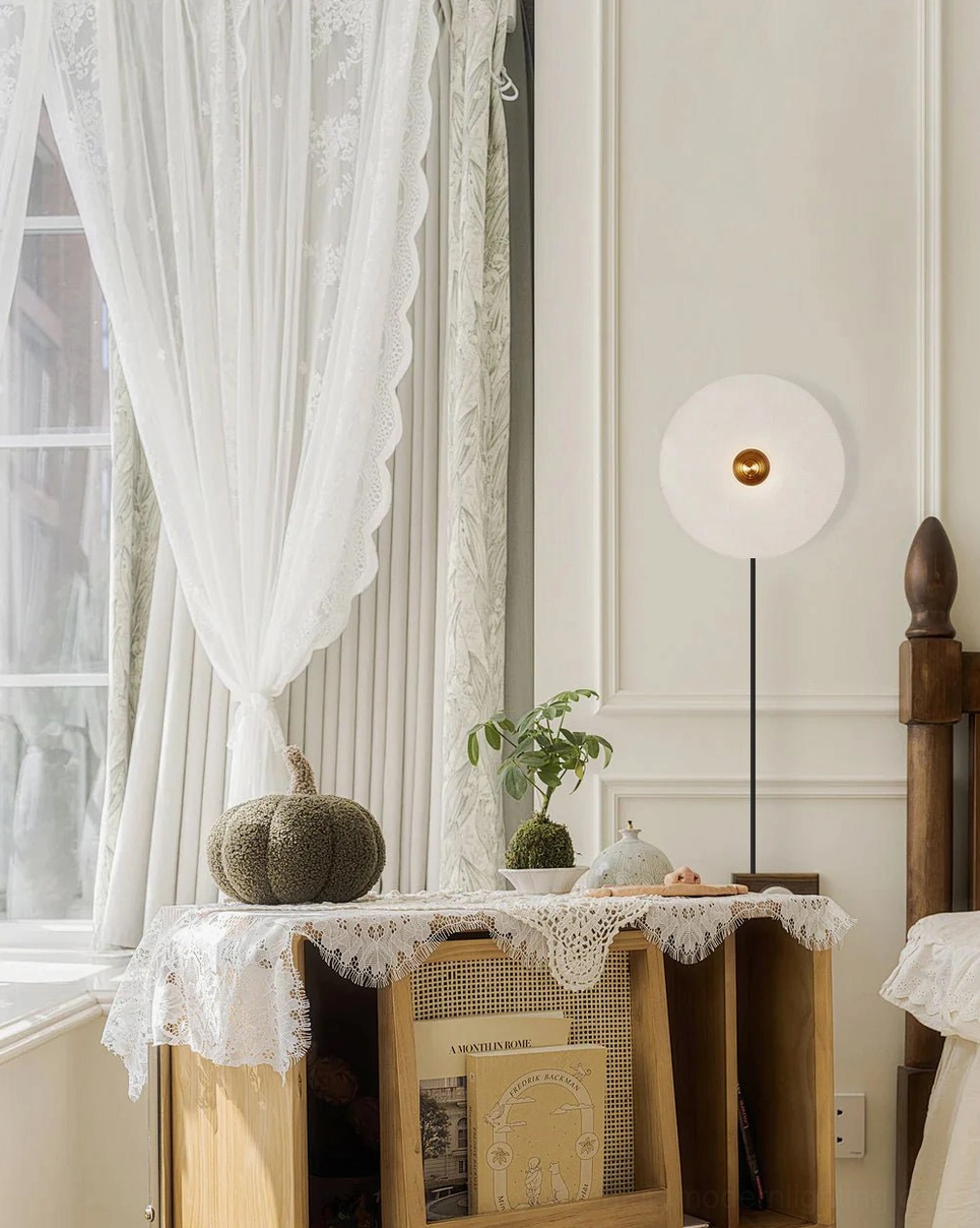 Mid-century modern alabaster sconce beside french-style window, romantic vintage aesthetic
