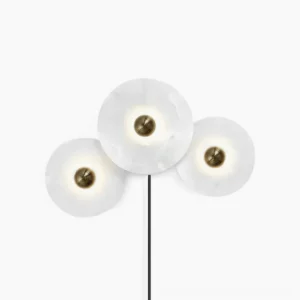 Asymmetrical three-disc alabaster combination wall lamp with bronze brass hardware, front view on white background