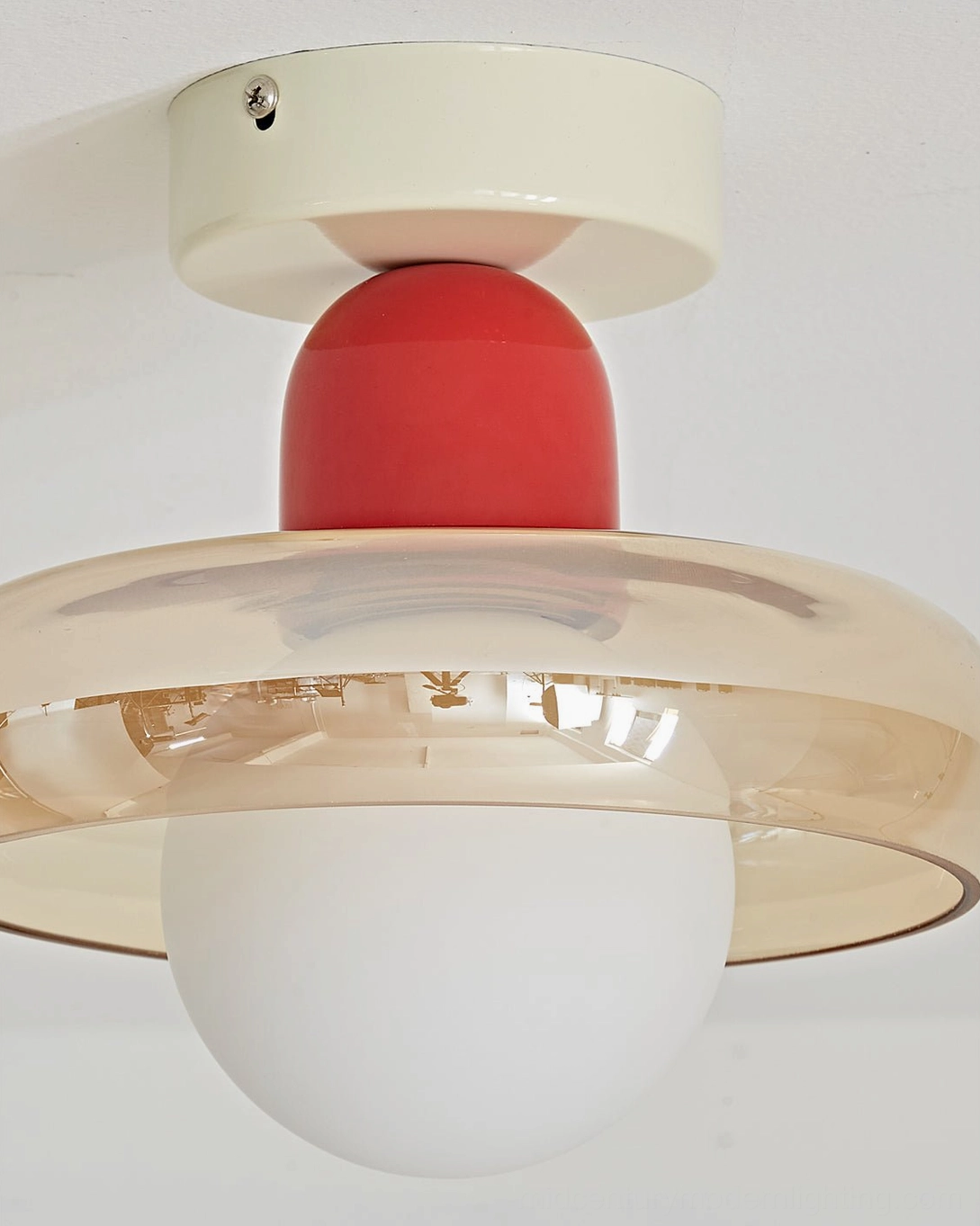 Alabax geometric ceiling light highlighting material quality and finish