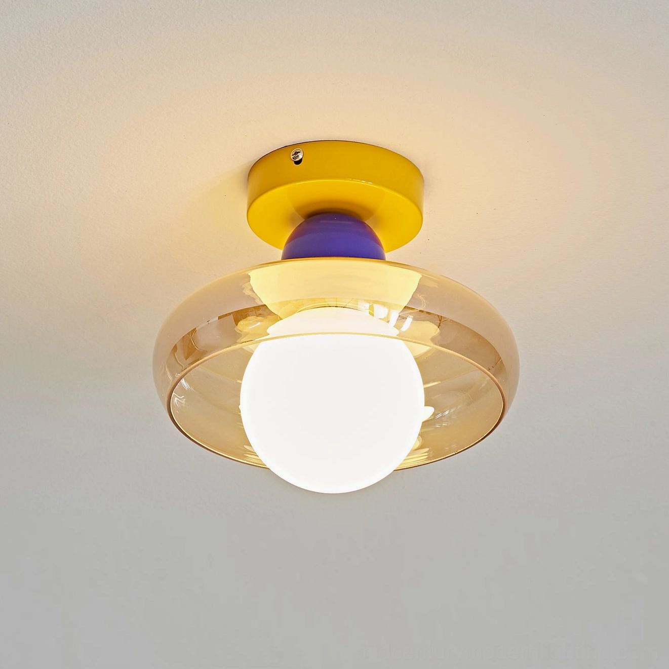 Illuminated Alabax ceiling light with warm glow and retro design accent