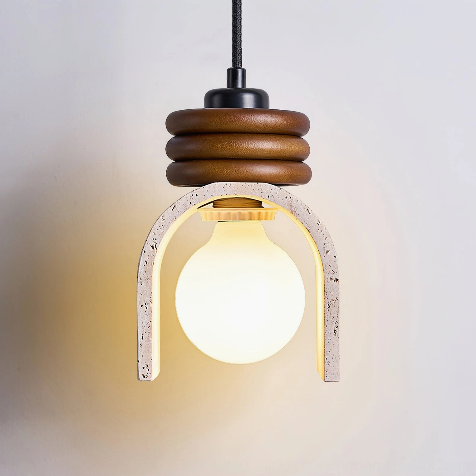 Alagusmo pendant lamp bottom-up view revealing exposed bulb socket and bright warm illumination