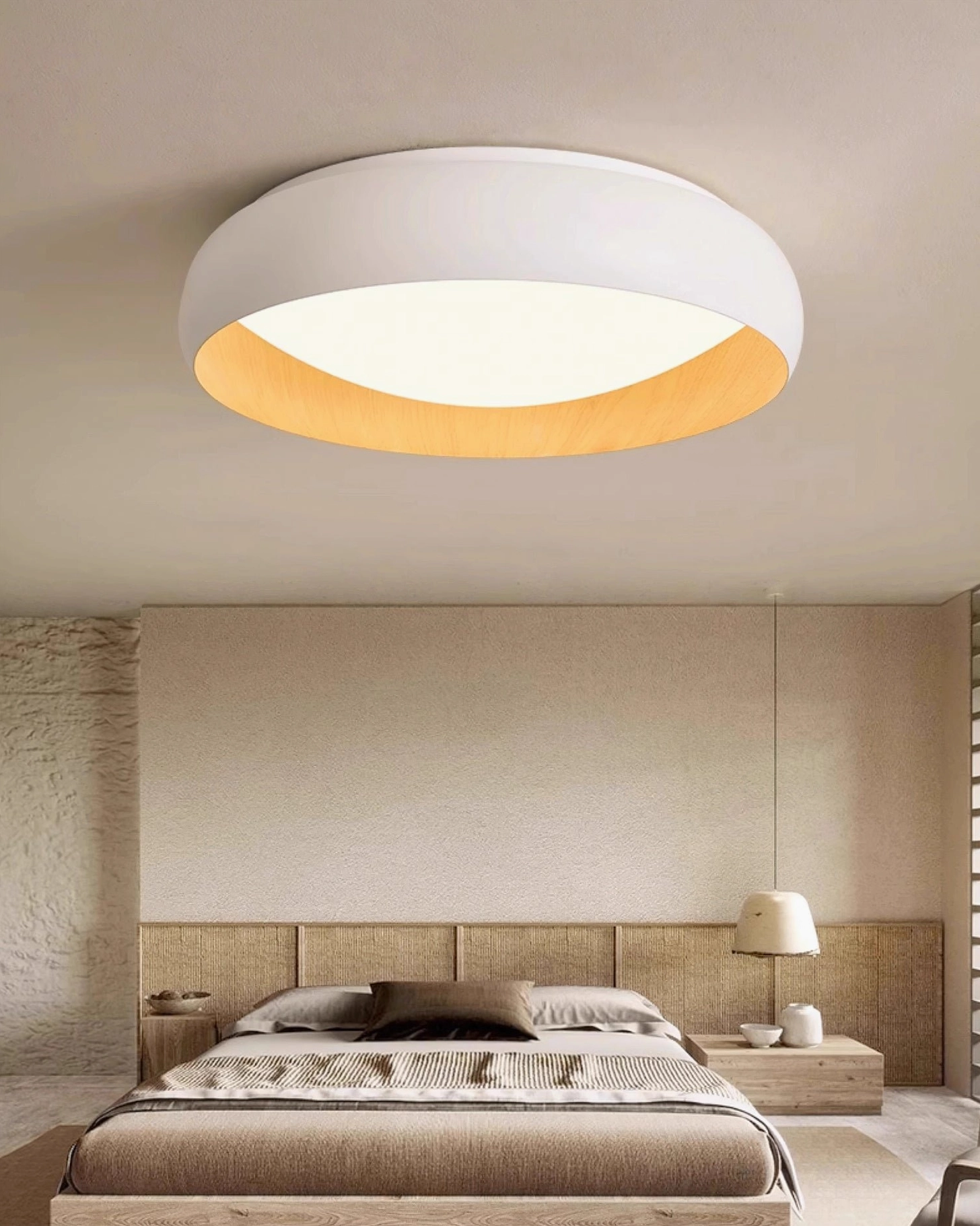 White round Alamus flush mount ceiling light with wood-grain trim in modern minimalist bedroom