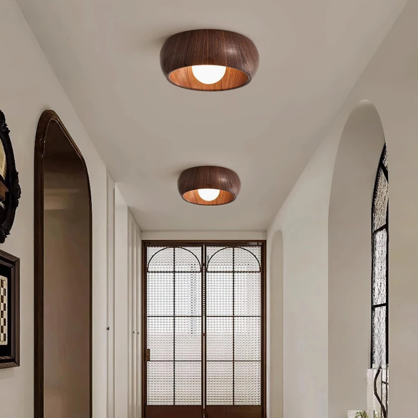 Alana Scandinavian ceiling light installed in minimalist arched hallway with grid glass door