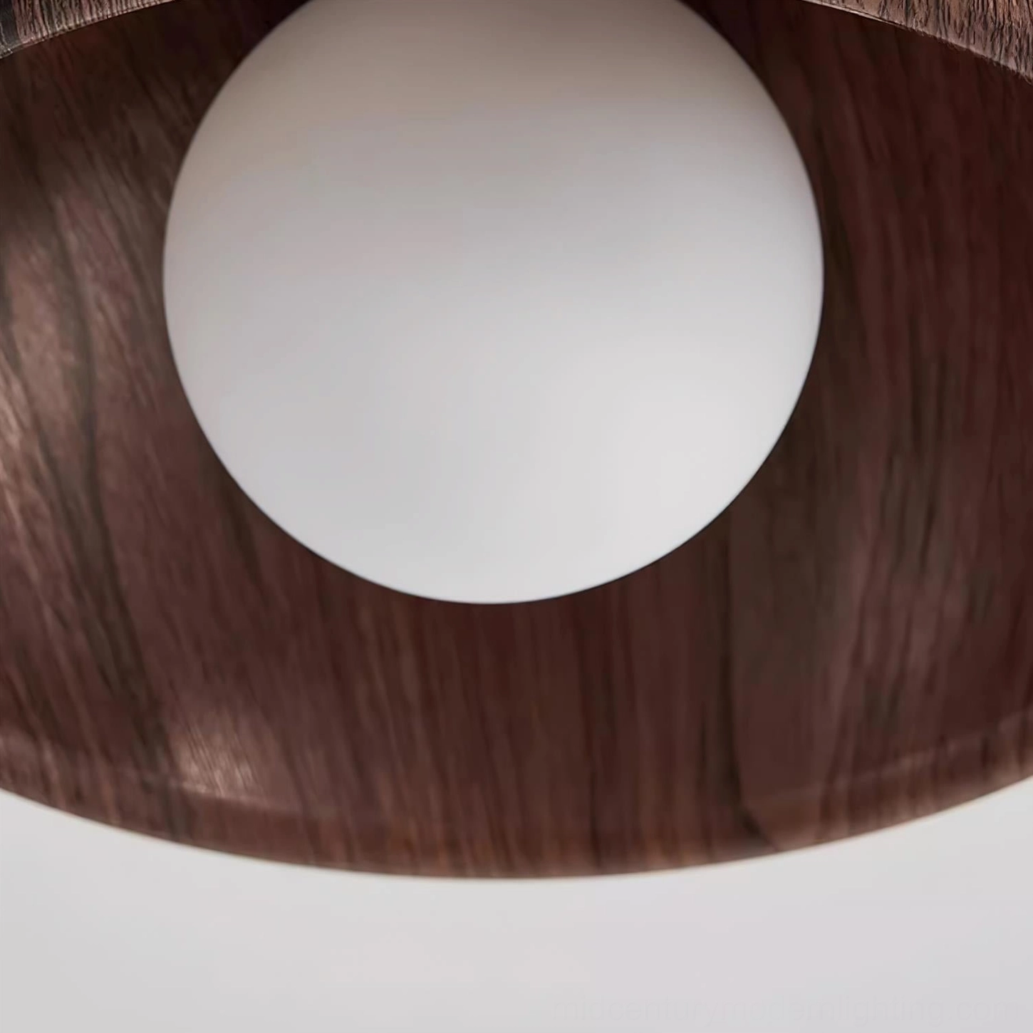 Walnut Alana flush mount ceiling light showing geometric circular frame design