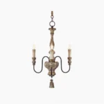 Alayna vintage pendant chandelier with three black metal distressed arms and wooden spindle base, front studio view