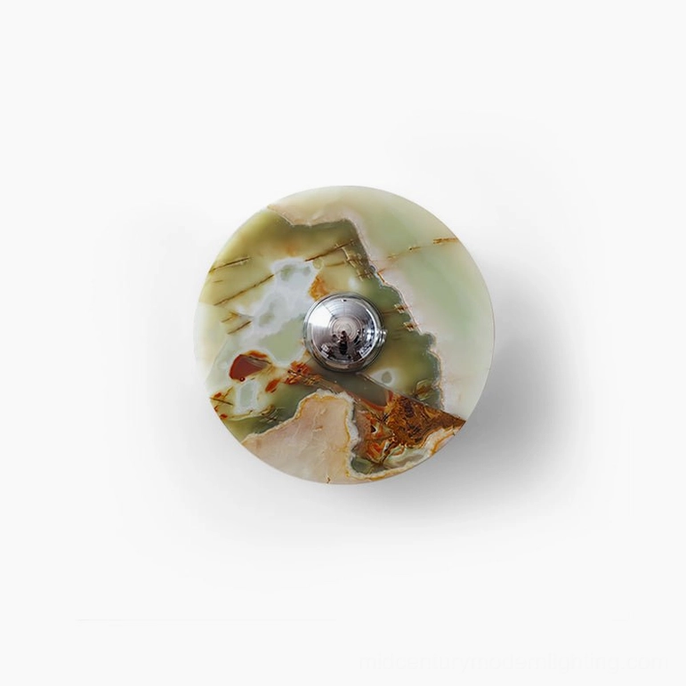 Alba marble wall fixture frontal overhead close-up emphasizing classic round disc shape and polished chrome center fixture detail
