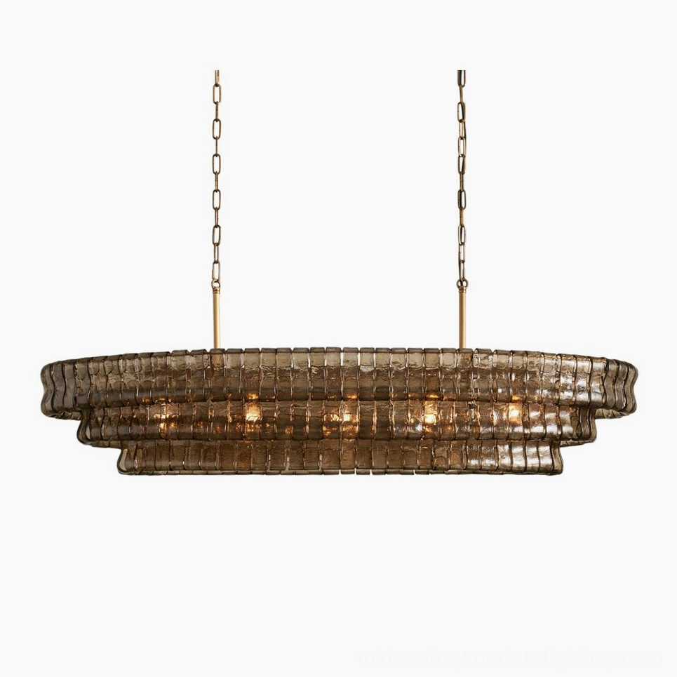 Albano tiered glass chandelier in smoky amber finish, overhead frontal studio view showcasing hand-assembled art glass louvers and brutalist mid-century modern design