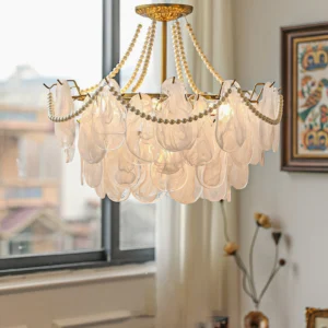 Modern petal glass chandelier three-quarter view in residential living room with ambient lighting